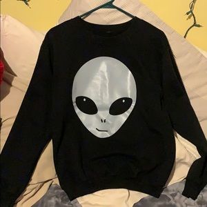 Black crew neck. Alien on front. Size small